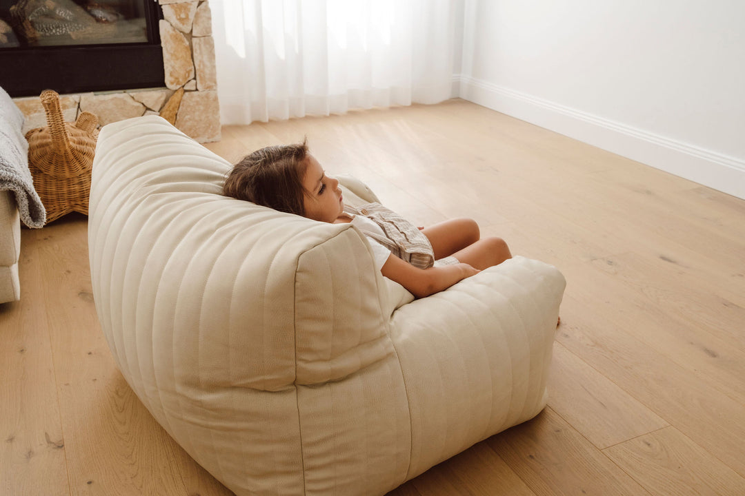 Child-friendly seating Ivory beanbag chairs for kids Neutral color beanbag loungers for children Stylish seating options for kids Soft and comfortable beanbag chairs for children Affordable kids' furniture Fun and functional seating solutions for kids' rooms Indoor and outdoor beanbag chairs for kids Easy-to-clean beanbag chairs for kids Portable and lightweight beanbag chairs for kids Kids' beanbag chairs with removable covers.